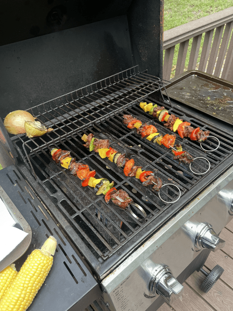 Steak kabobs being grilled