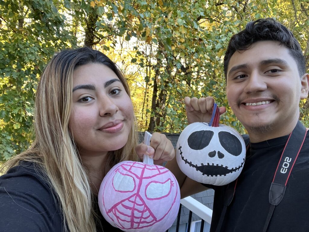 Susie and Steven holding Pumpkins 